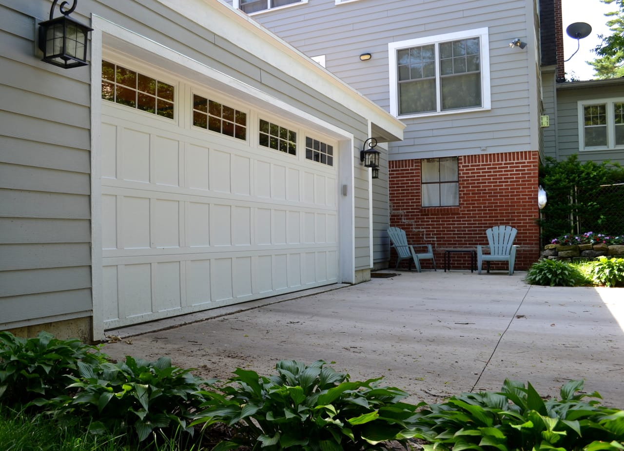 brick-house-with-white-garage-door